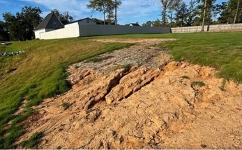 Before: washed-out roadside ditch