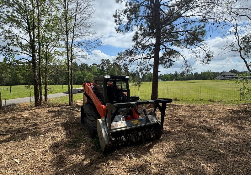 Forestry mulching equipment at work on a property